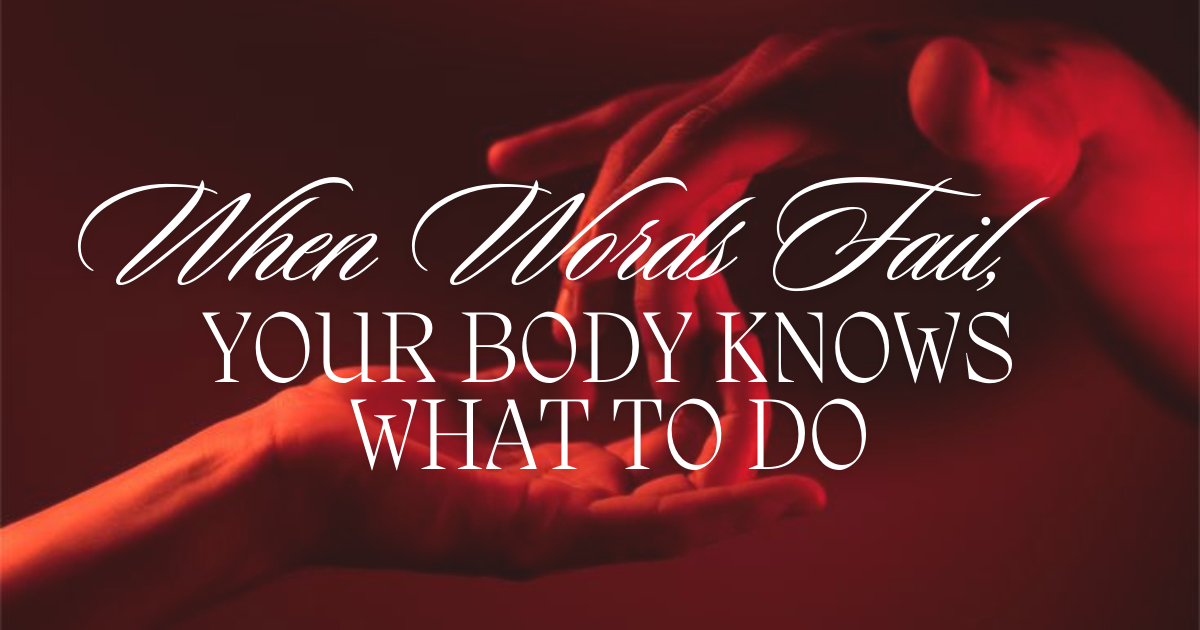 Two hands reaching toward each other in warm red light with the words ‘When words fail, your body knows what to do’ overlaid in elegant script.
