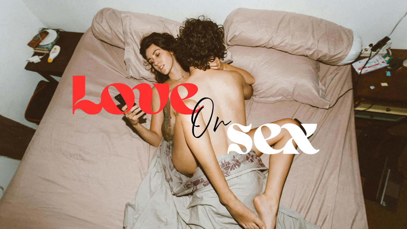 Close‑up of a couple in bed, one partner leaning gently into the other with soft, warm lighting, capturing the contrast between tender emotional connection and quiet sexual tension.