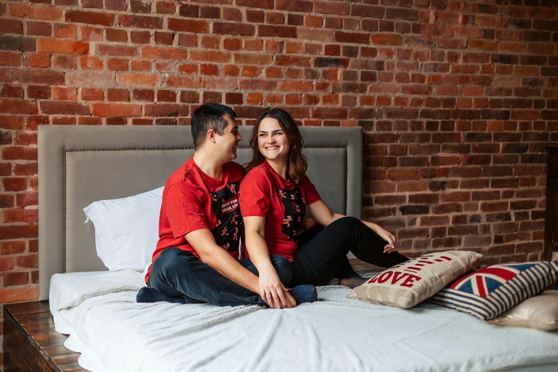 Couple sitting together discussing sexual health and intimacy.