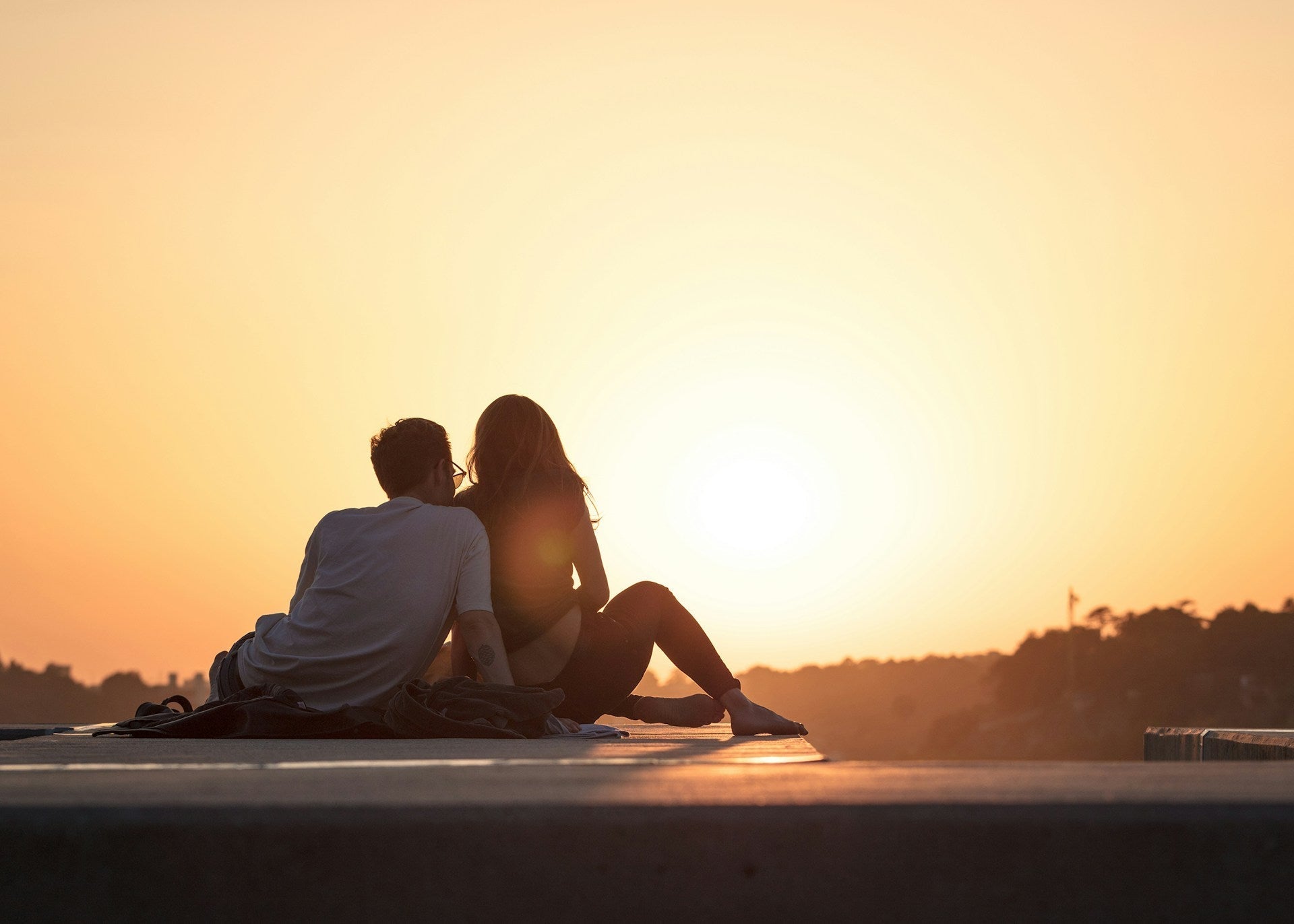 couple sharing intimate moments outdoors